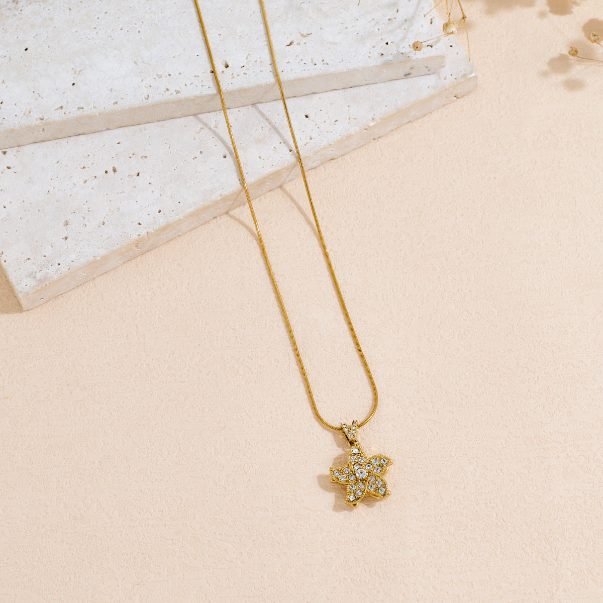 Rotating Flower Shaped Stainless Steel Pendant Necklace