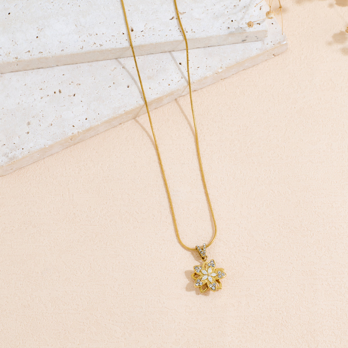 Rotating Flower Shaped Stainless Steel Pendant Necklace