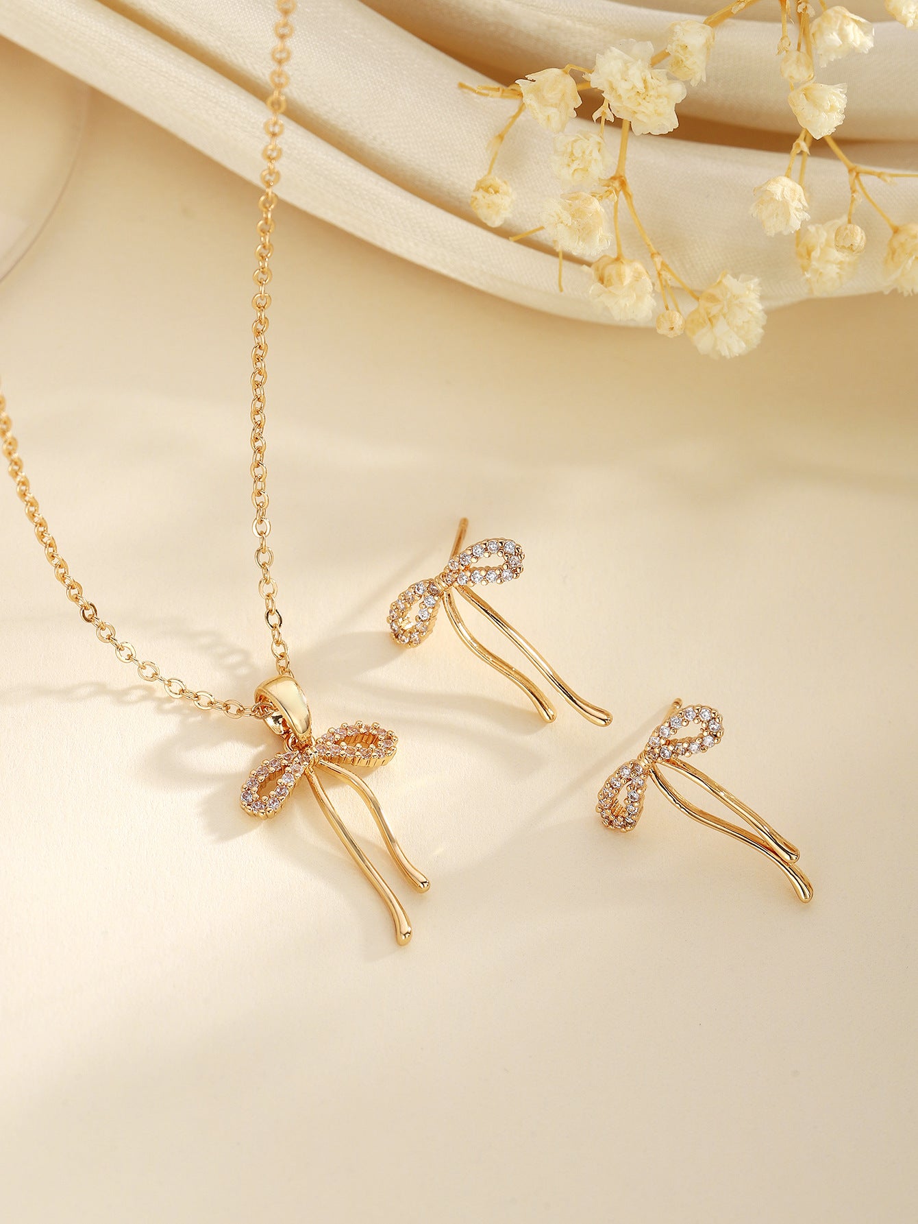 Copper Inlaid Zircon Bow Pendant Earrings Two-Piece Set