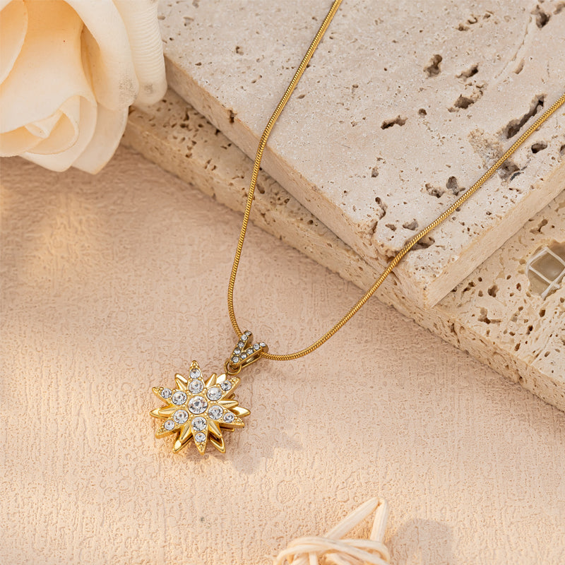 Rotating Flower Shaped Stainless Steel Pendant Necklace
